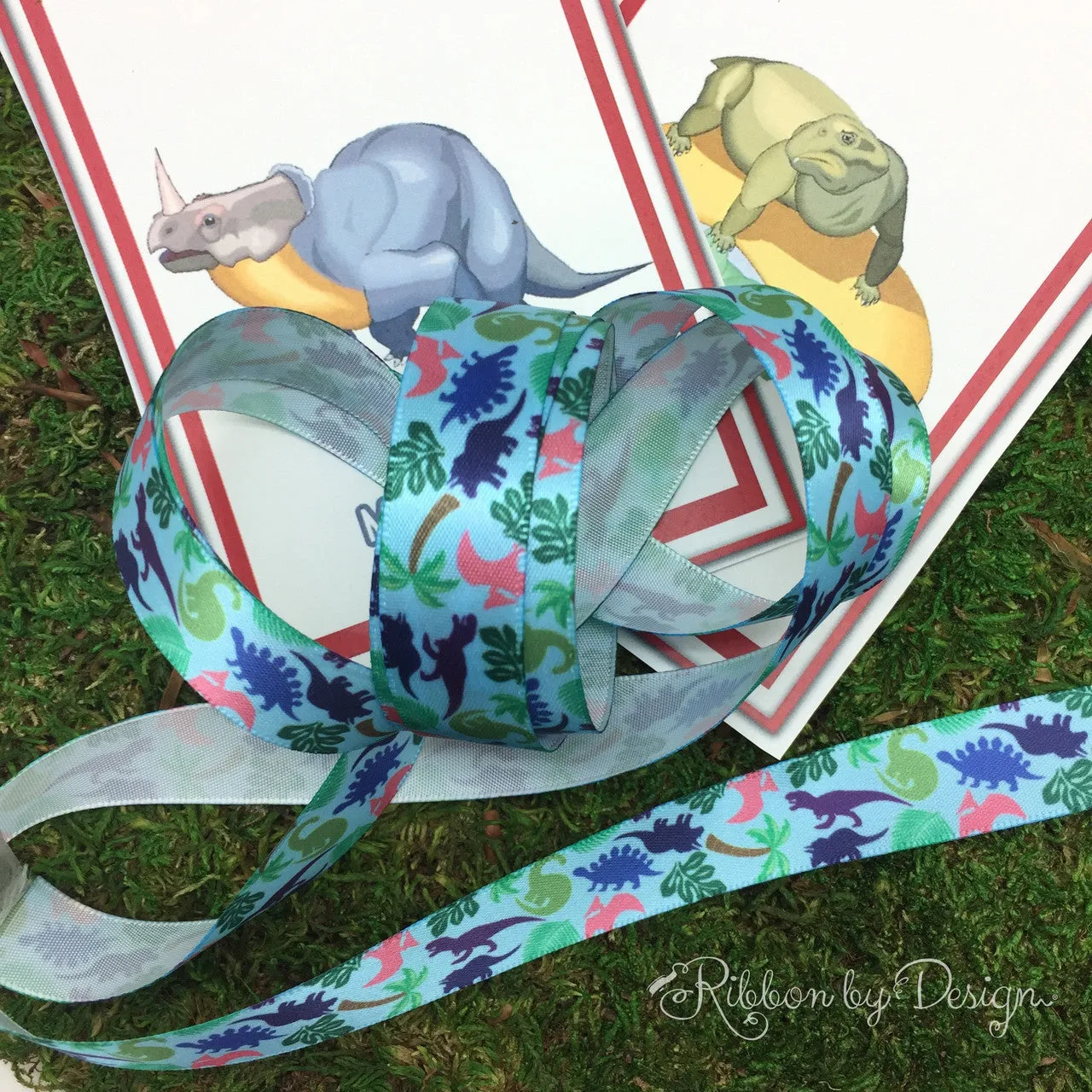 Dinosaur Ribbon printed on 5/8" Lt. Blue single face satin